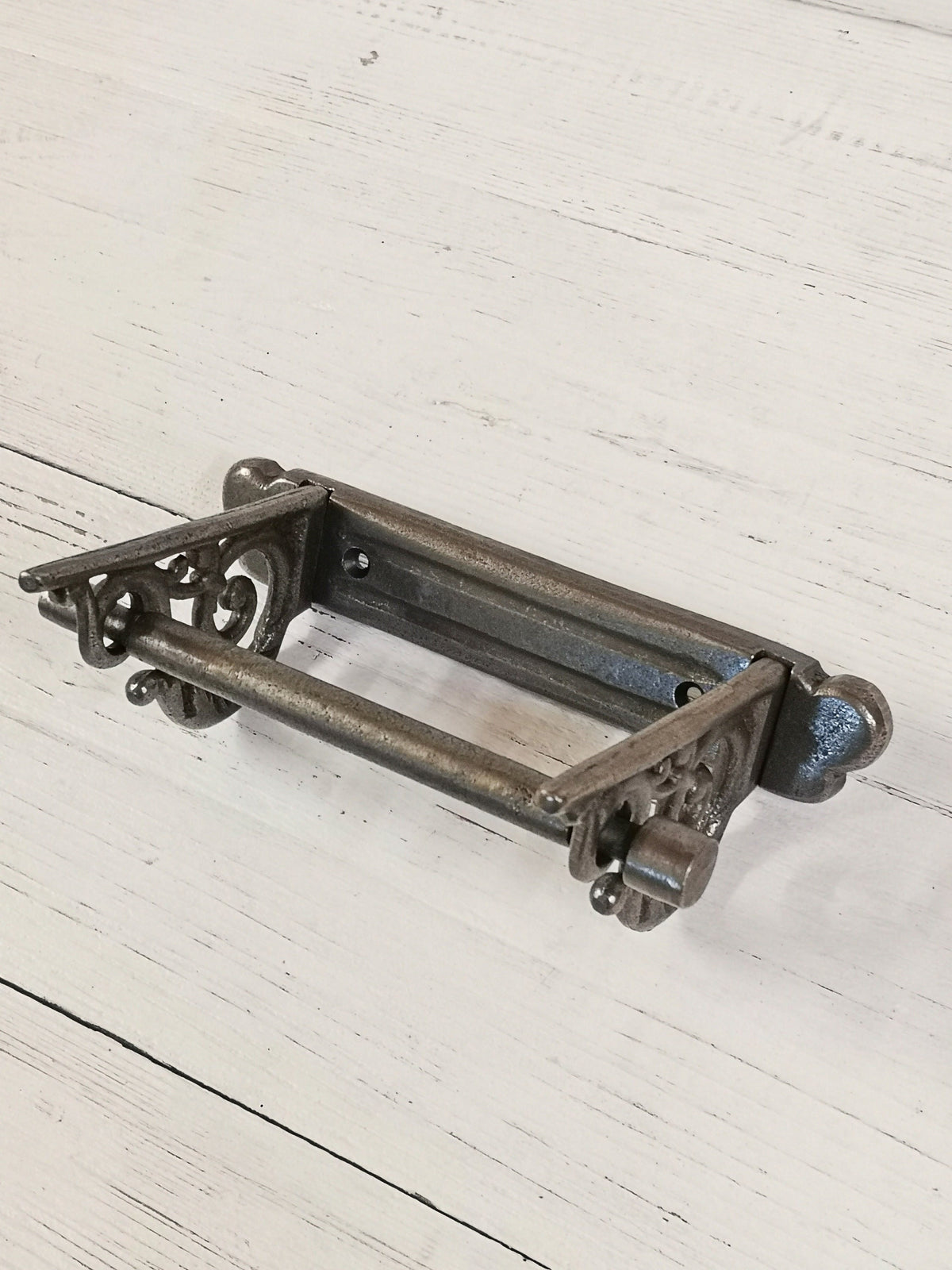 Toilet roll holder cast antique iron - very elegant, scroll design. Wall mounted