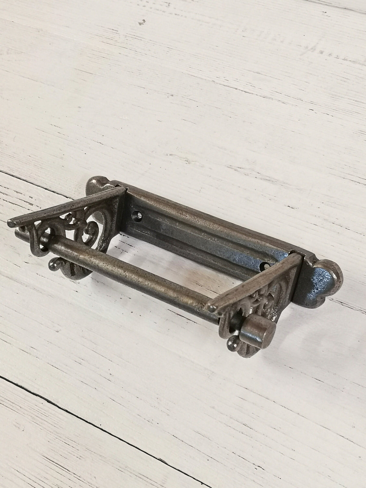 Toilet roll holder cast antique iron - very elegant, scroll design. Wall mounted Choose from London GNER or Traditional