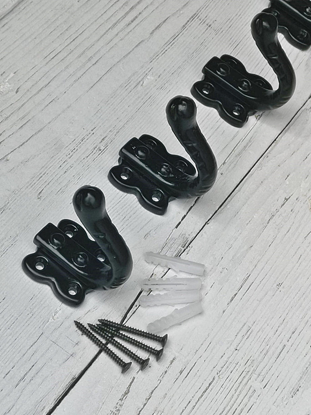 Steel Tudor Coat single Hooks Black powdered finish Wrought Iron Hammered Effect Screws included. Butterfly design