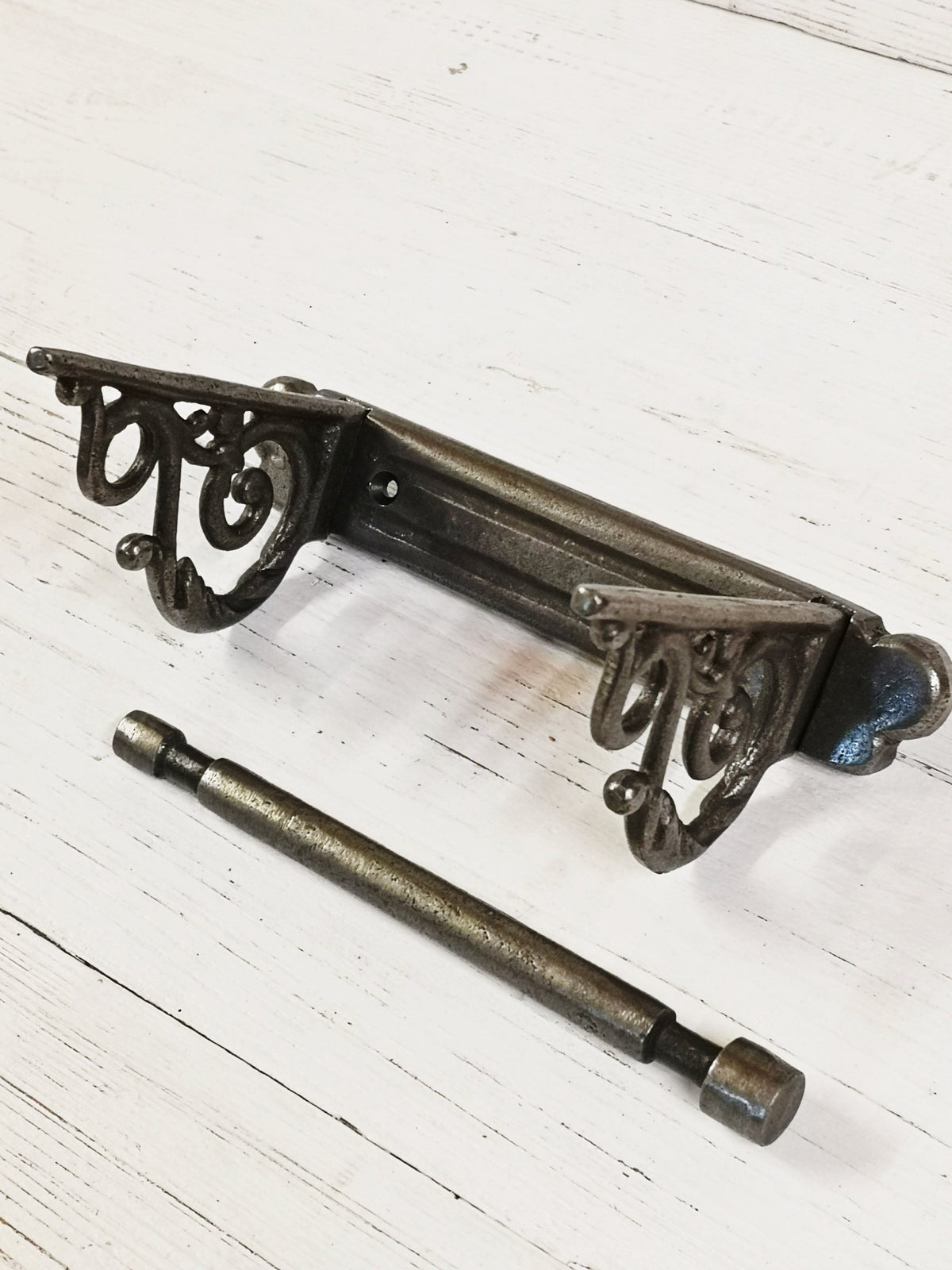 Toilet roll holder cast antique iron - very elegant, scroll design. Wall mounted