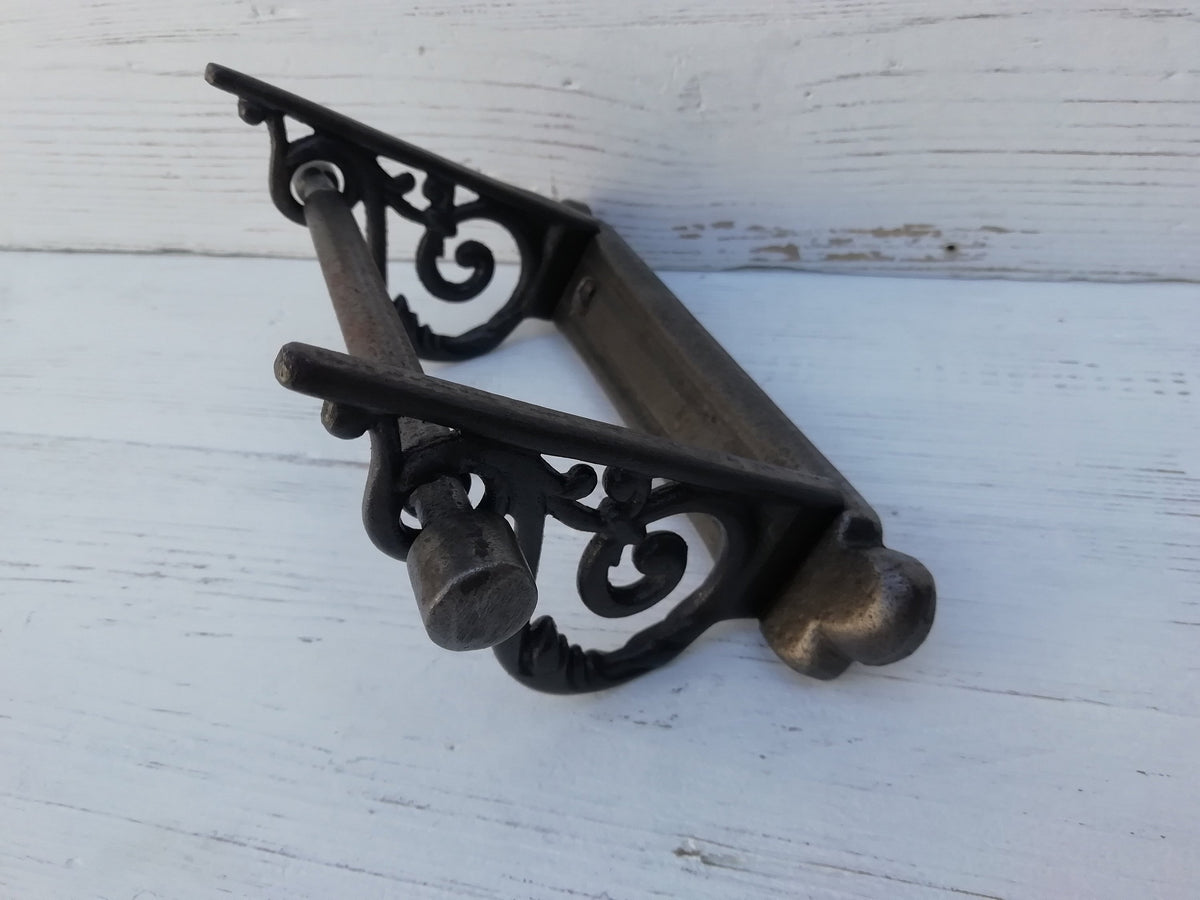 Toilet roll holder cast antique iron - very elegant, scroll design. Wall mounted