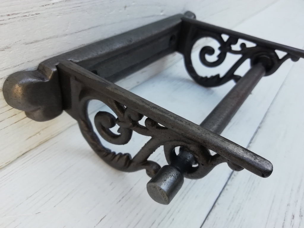 Toilet roll holder cast antique iron - very elegant, scroll design. Wall mounted