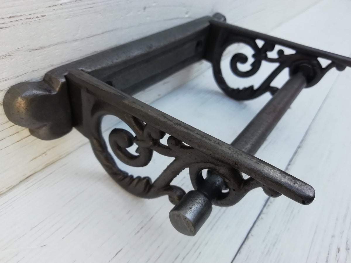 Toilet roll holder cast antique iron - very elegant, scroll design. Wall mounted