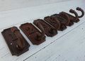 SET of 6 Retro Numbered Coat Hook Cast Iron in a Retro Antique Finish, No 1 - 6 rust