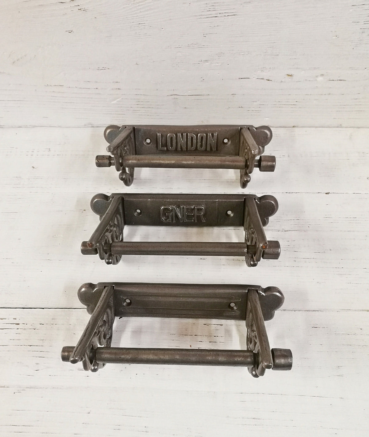 Toilet roll holder cast antique iron - very elegant, scroll design. Wall mounted Choose from London GNER or Traditional