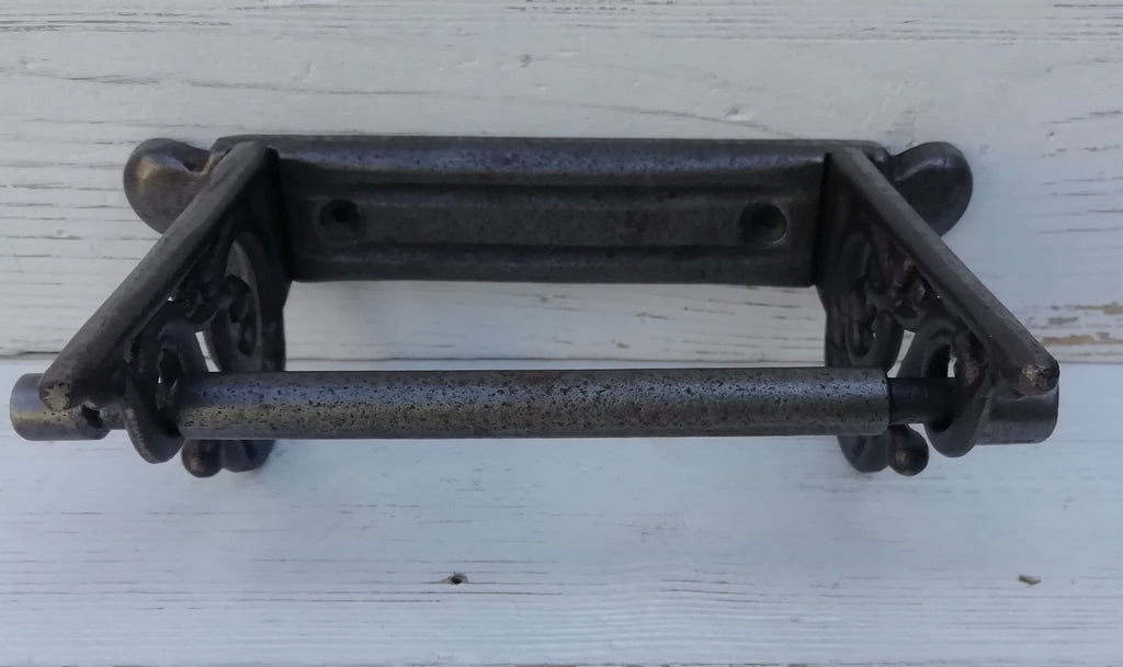 Toilet roll holder cast antique iron - very elegant, scroll design. Wall mounted